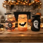 16 Ghoulish Halloween Candle Jar Crafts for a Frightfully Home Halloween candle jar crafts